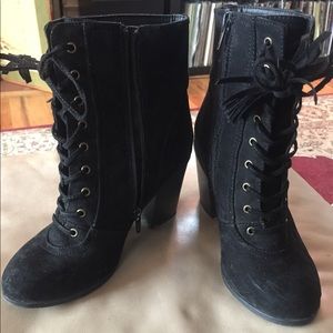 Women's black zip up/ lace up boots size 5.5